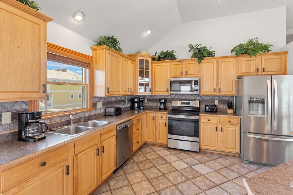 Whip up something delicious in the Top-Level Kitchen with modern appliances and lots of prep space!