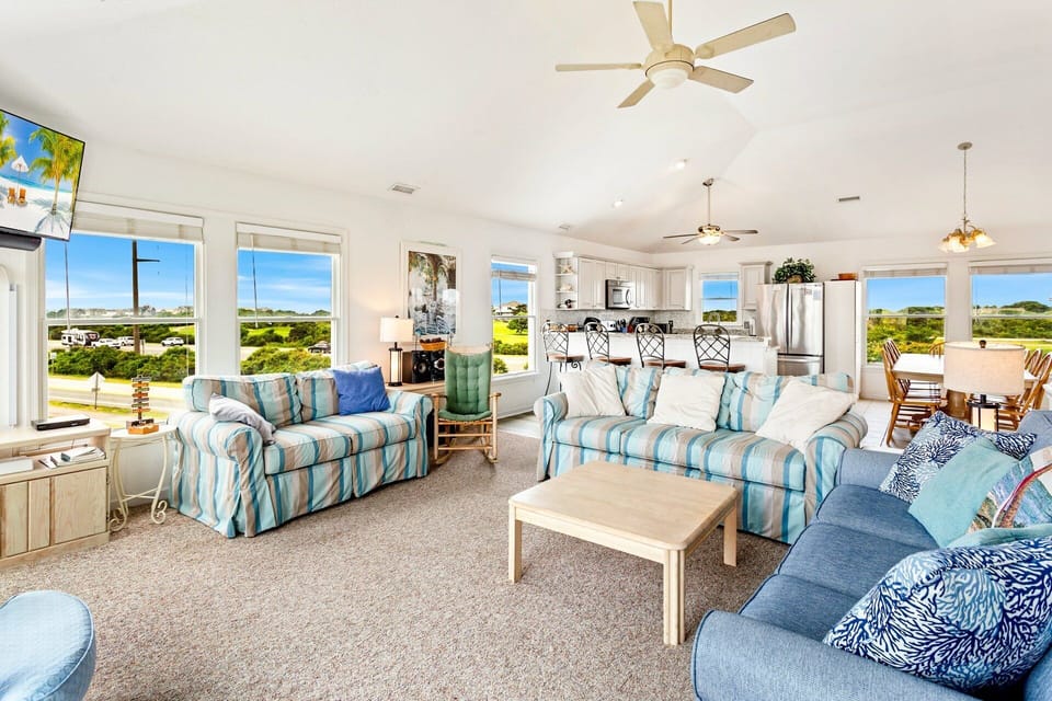 Reconnect with the family in the great room, which features a living room with large flat screen TV with Blu-Ray and stereo.