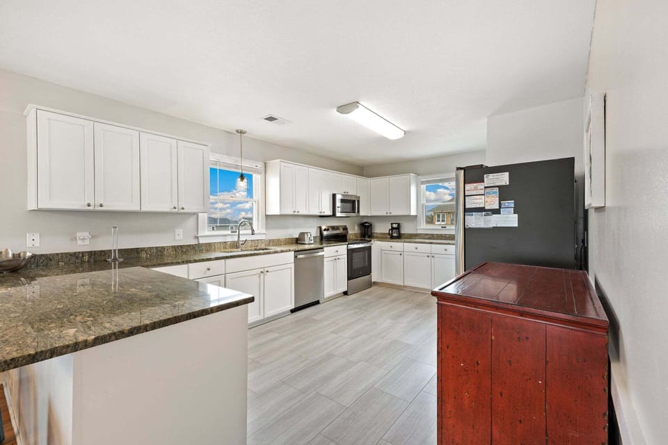 Whip up something delicious in the Kitchen with modern appliances and plenty of prep space.