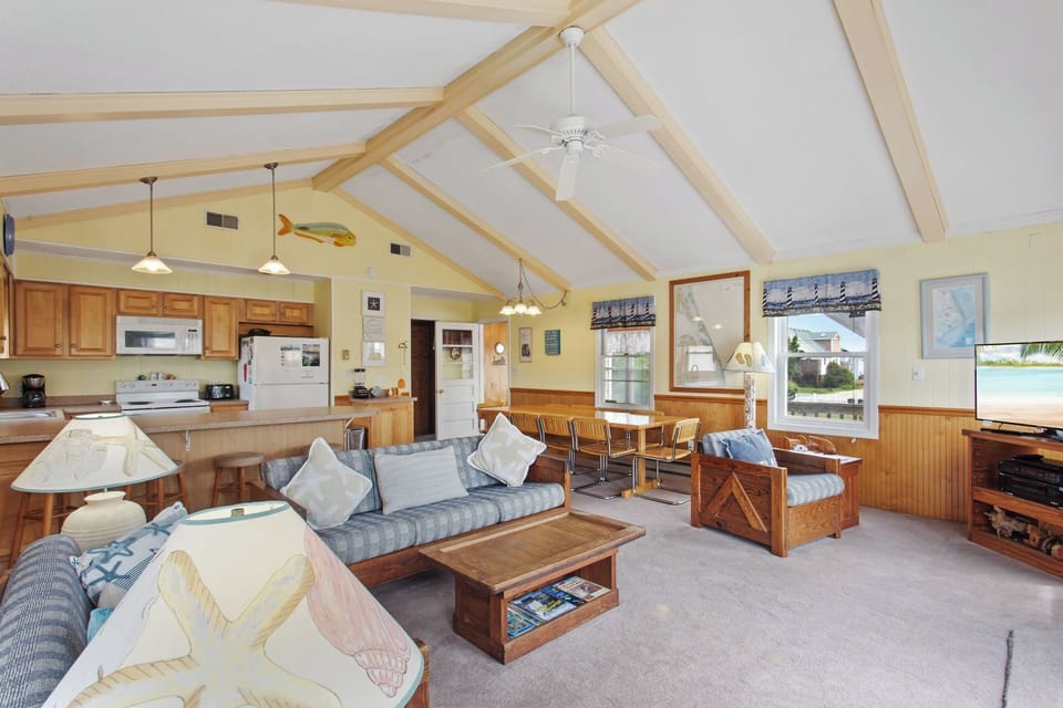The open-concept floor plan keeps everyone close and enjoying your stay.