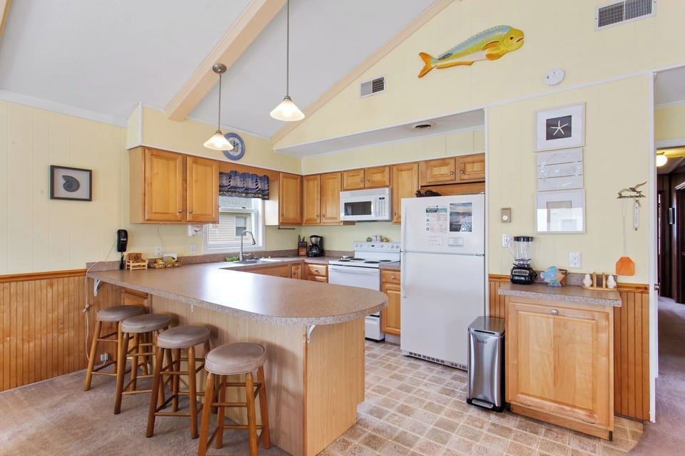 Whip up something delicious in the quaint Kitchen with all modern appliances and everything you need to enjoy a spectacular feast.