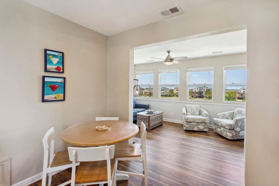 Soak up the sun with your favorite beach read in the additional Living Area just off the Kitchen.