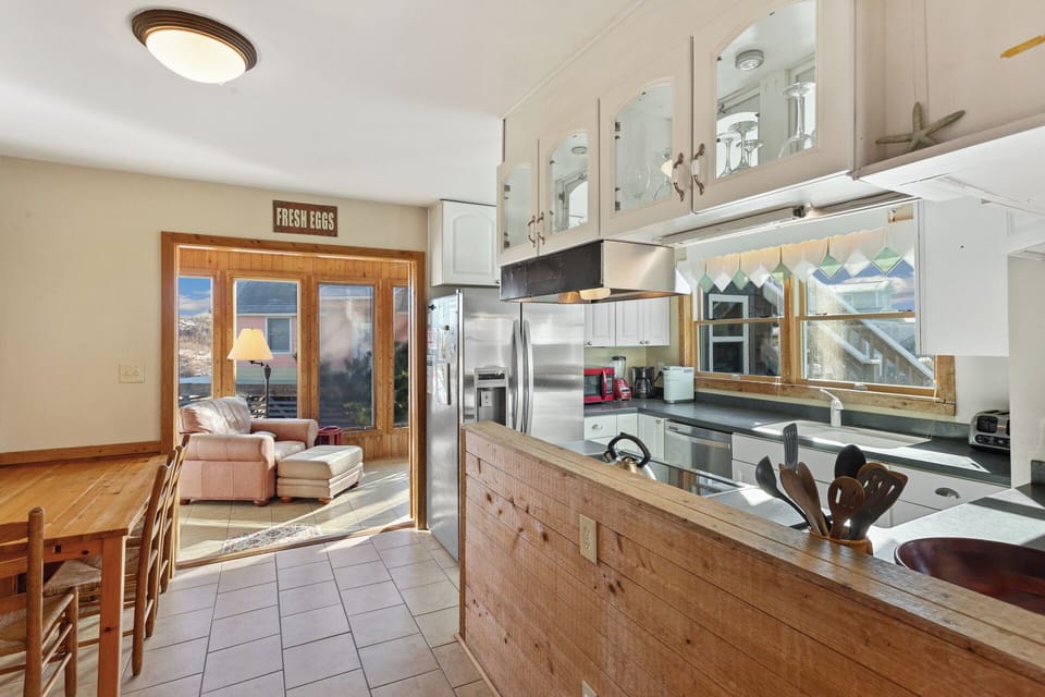 Impress the family with your cooking skills in the Kitchen with a coffee pot and modern appliances.