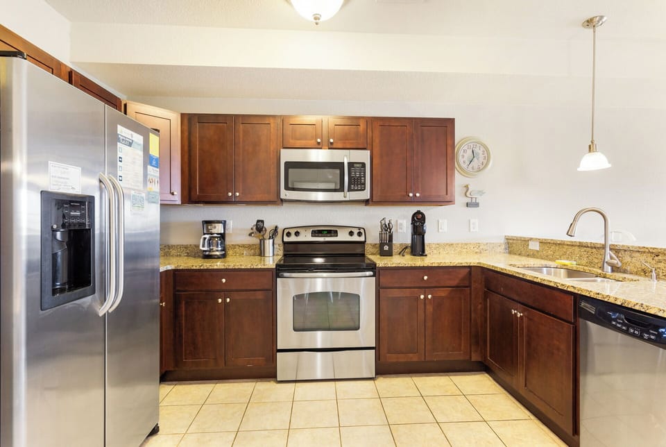 Whip up something delicious in the modern Kitchen with plenty of prep space.