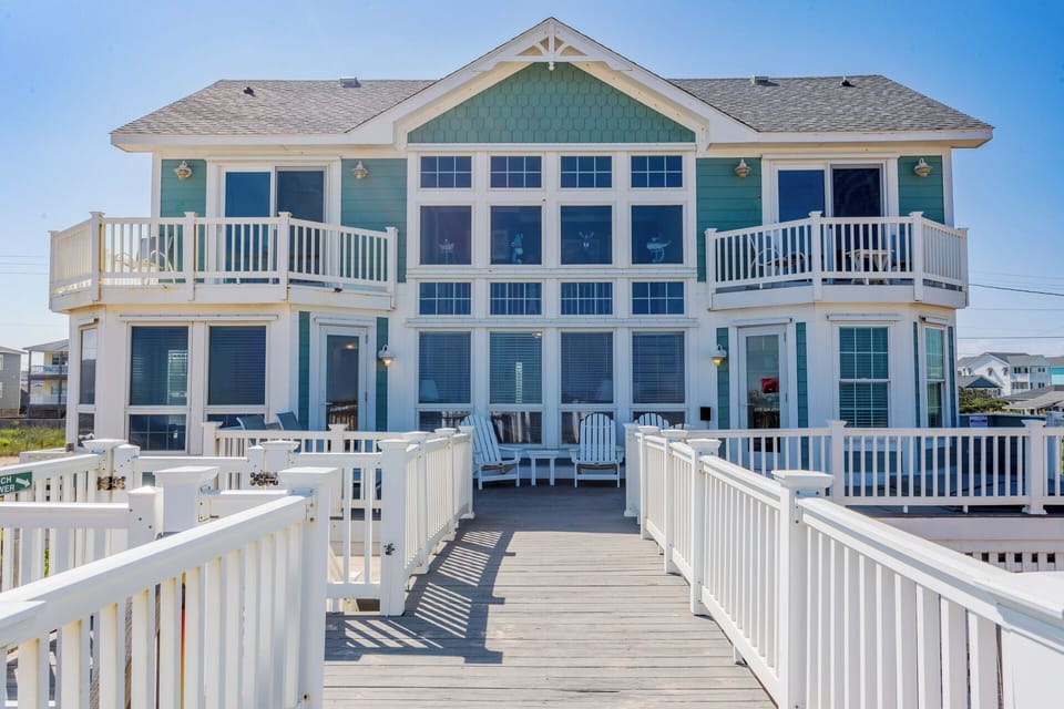 Furnished deck spaces designed for lounging and coastal relaxation.