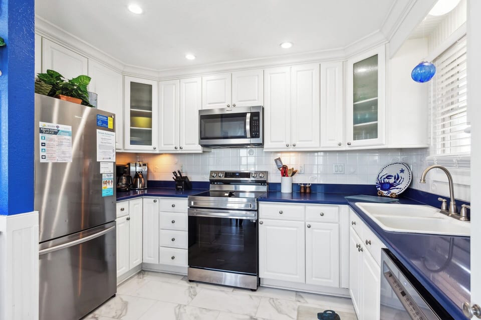 Full kitchen equipped for easy vacation meals and entertaining.