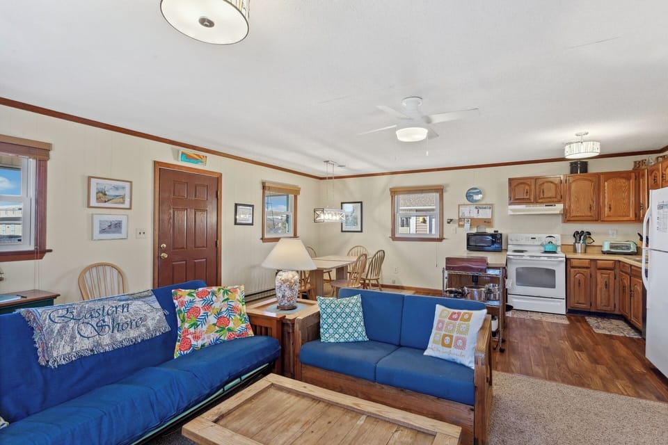 Relax in the spacious Living Area and gather around the Flat Screen TV for family movie night or a calm afternoon on TV on a rainy day.