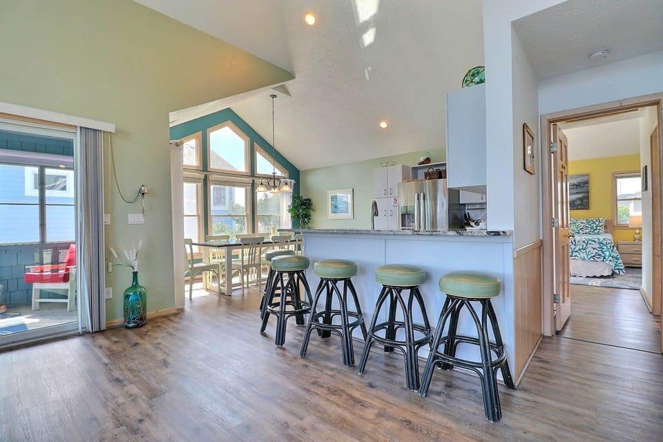 The spacious dining area offers seating for 10, making it ideal for family meals and gatherings.