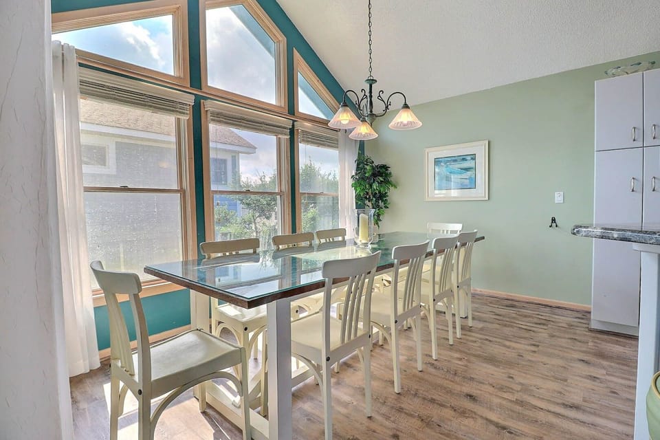 The spacious dining area offers seating for 10, making it ideal for family meals and gatherings.
