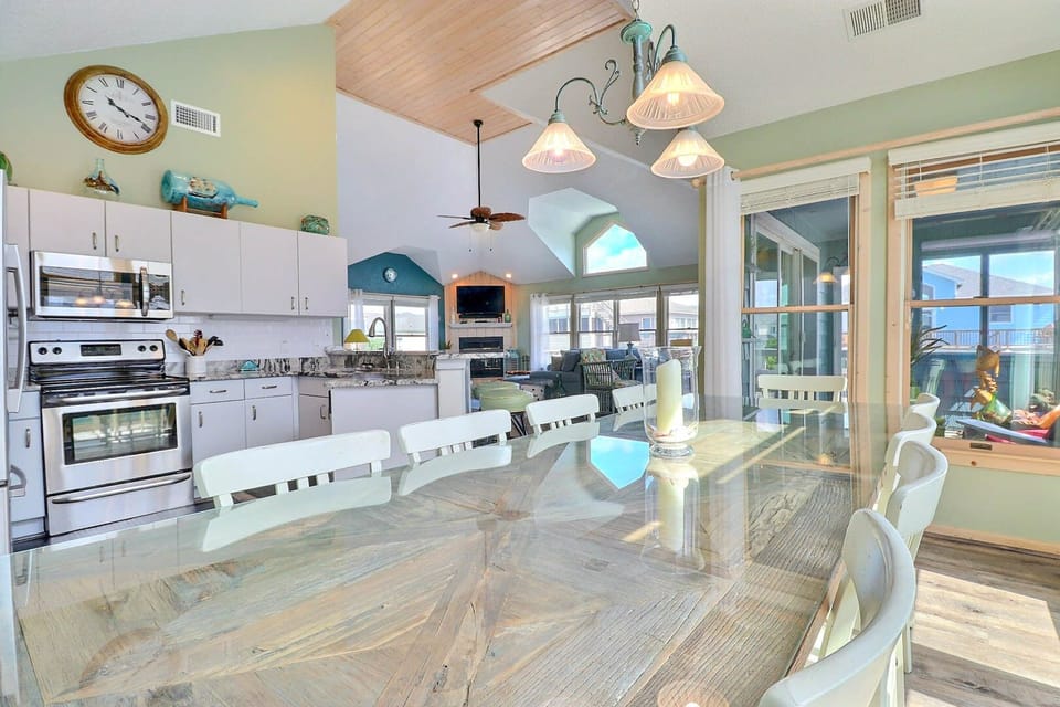 The spacious dining area offers seating for 10, making it ideal for family meals and gatherings.