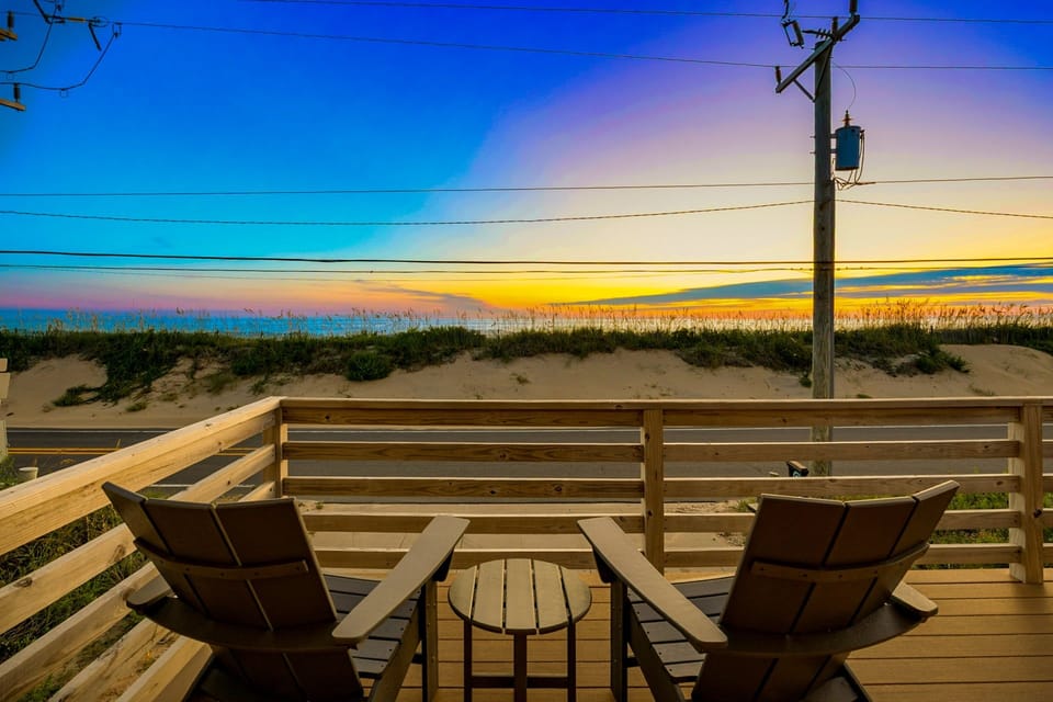 The partially covered front deck provides both sunny and shaded spots to relax while taking in stunning views of the Atlantic Ocean.
