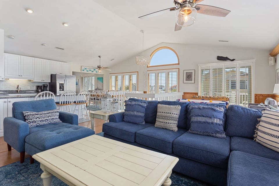 Relax in the spacious Living Area with a TV and lots of comfortable seating options.
