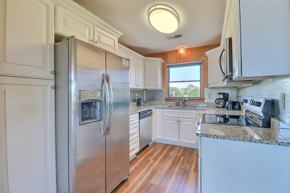 Whip up something delicious in the Kitchen with modern appliances and plenty of prep space.