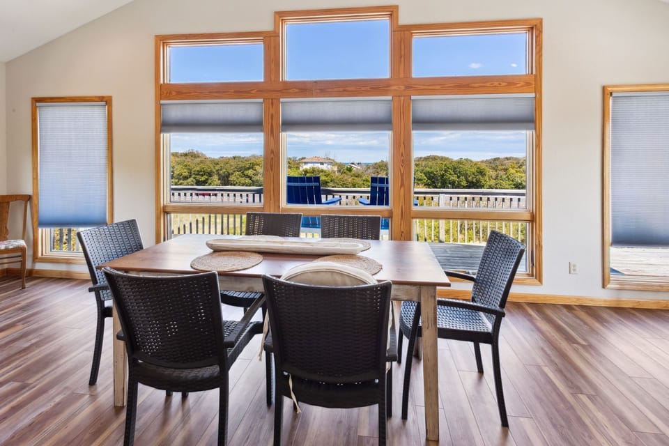 Feast together in the Dining Area with spectacular views and bright skies!