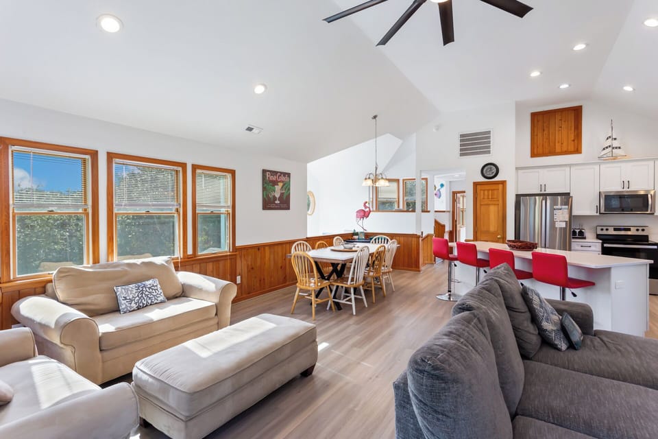 Relax in the spacious Living Area with high ceilings and a large Flat Screen TV!