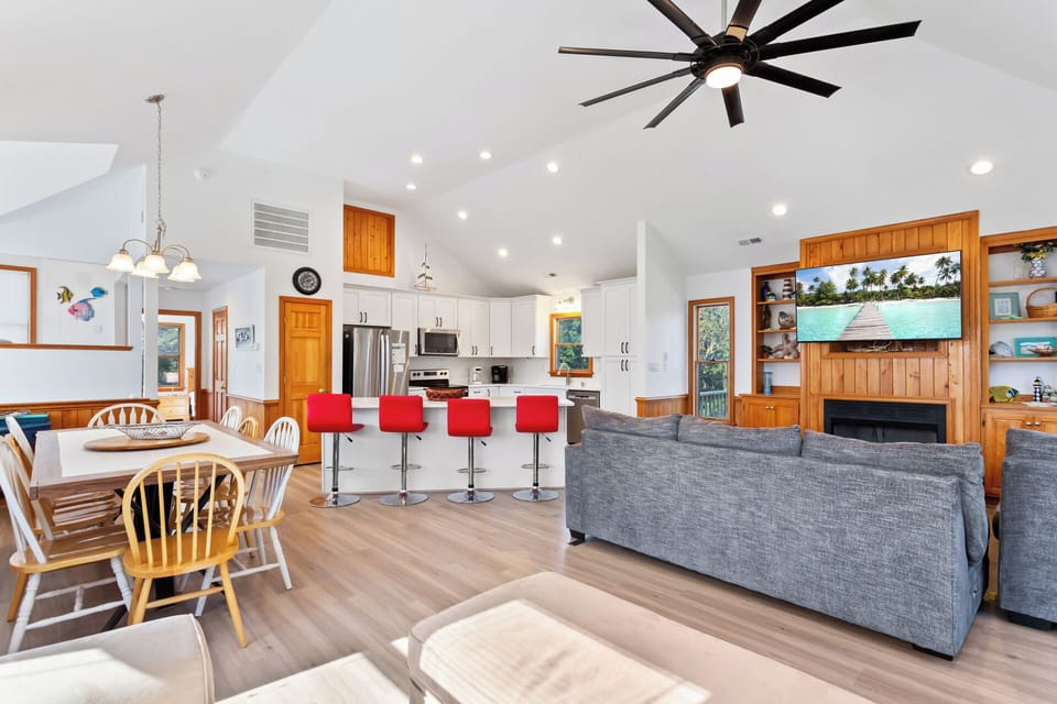 The open-concept Main Level offers a bright and airy vacation experience. (NOTE: Fireplace is NOT for Guest Use.)