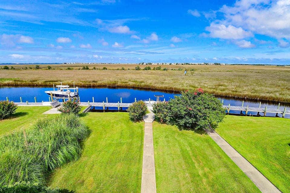 Enjoy al fresco dining on the back deck with water views!