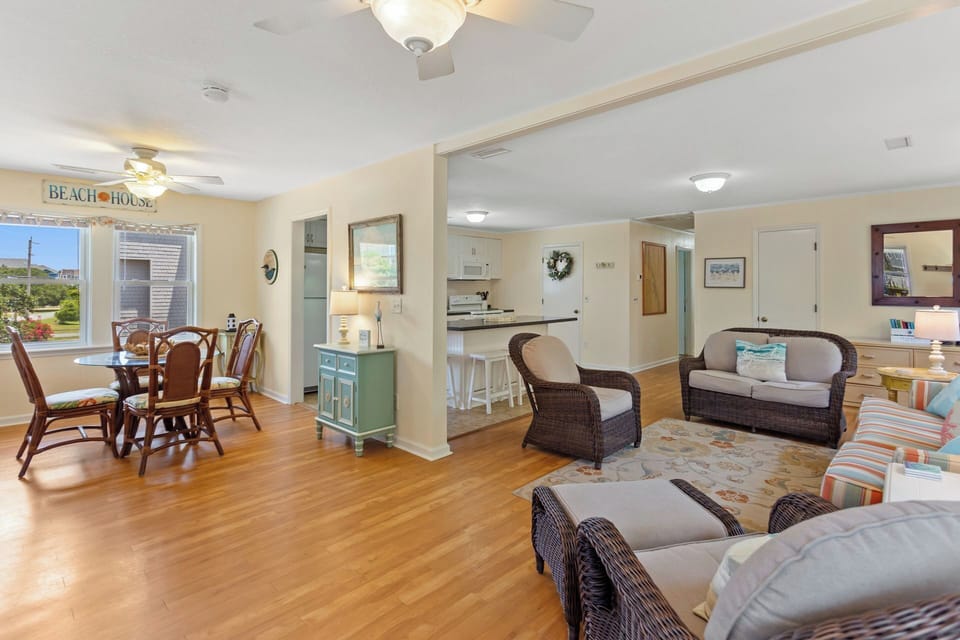 Relax in the spacious Living Area with a Flat Screen TV and lots of cozy furniture.