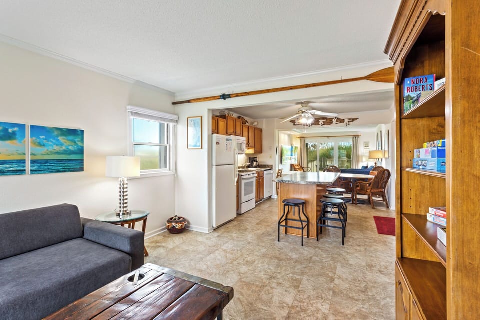 Gather around in the main Living Area with lots of windows and an open-concept floor plan.