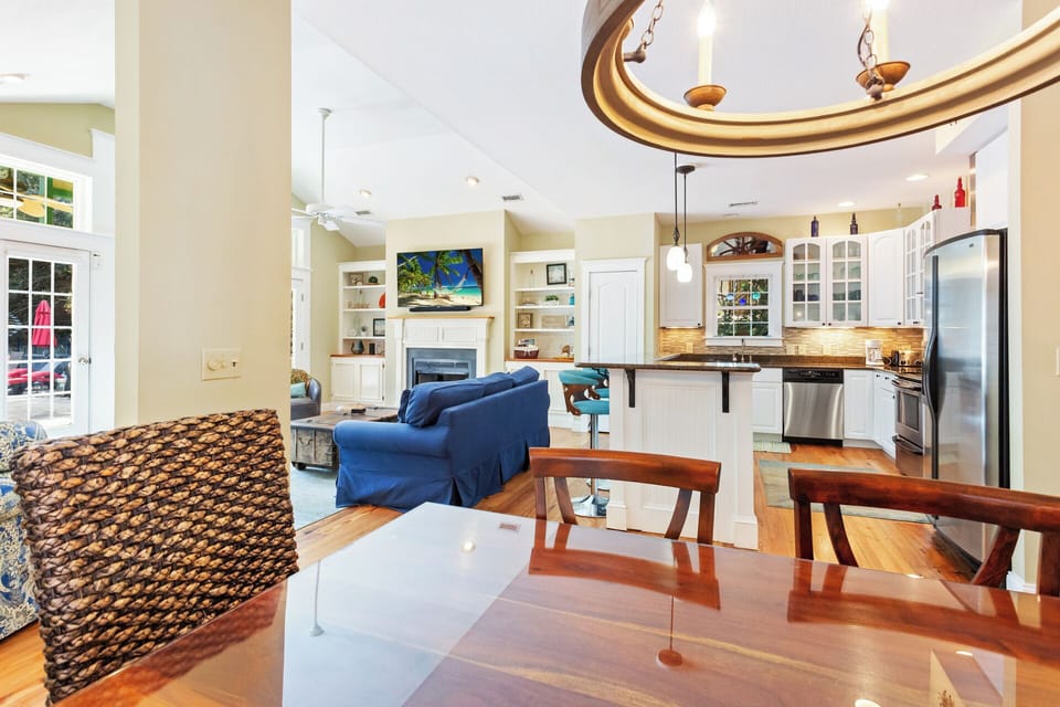 Enjoy the spacious Living Area with a variety of comfortable seating, a fireplace, and a flat-screen TV!