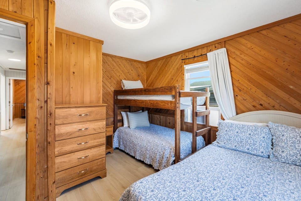 Bunk + Queen Bedroom: Perfect for kids, this bedroom offers a twin bunk set and a queen bed.
