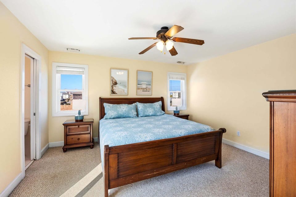 The top-level King ensuite bedroom provides a private retreat with deck access and ocean views.