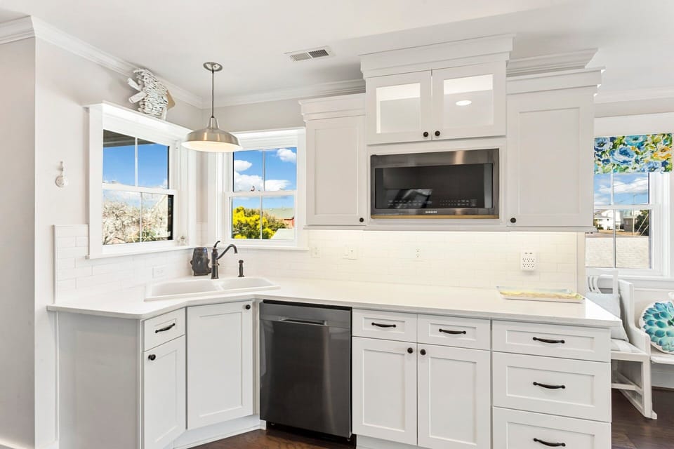 The Kitchen with quartz countertops has everything need, including a gourmet knife set and a Keurig/coffee pot combo.