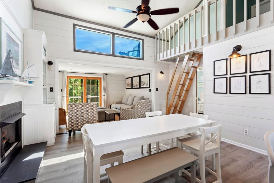 Eat together in the bright Dining Area after making a delicious meal in the modern Kitchen.