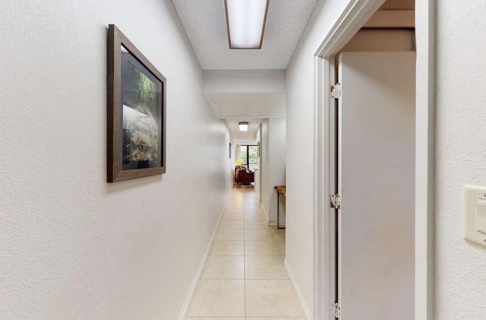 Entry way with door to the bedroom on right