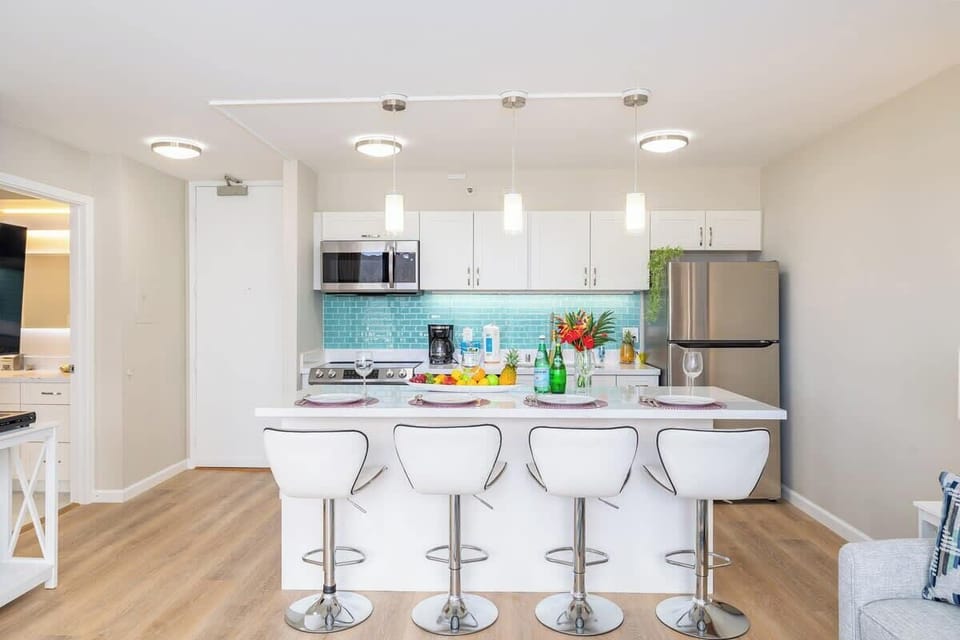Fully equipped kitchen. Access to the bathroom also from  the living room.