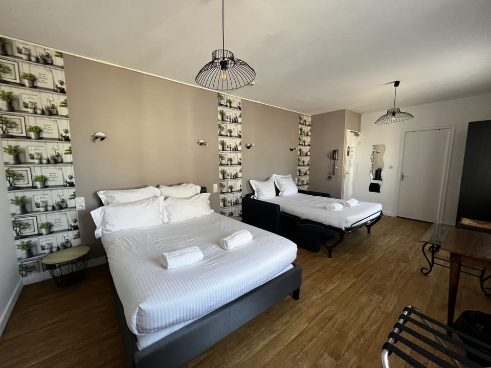 Family Room | Premium bedding, individually decorated, desk, laptop workspace