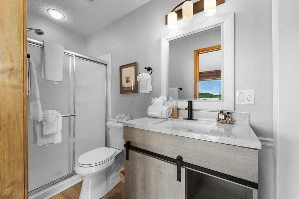 BATHROOM 2 - ADJOINING BEDROOM 1 ON MAIN LEVEL
