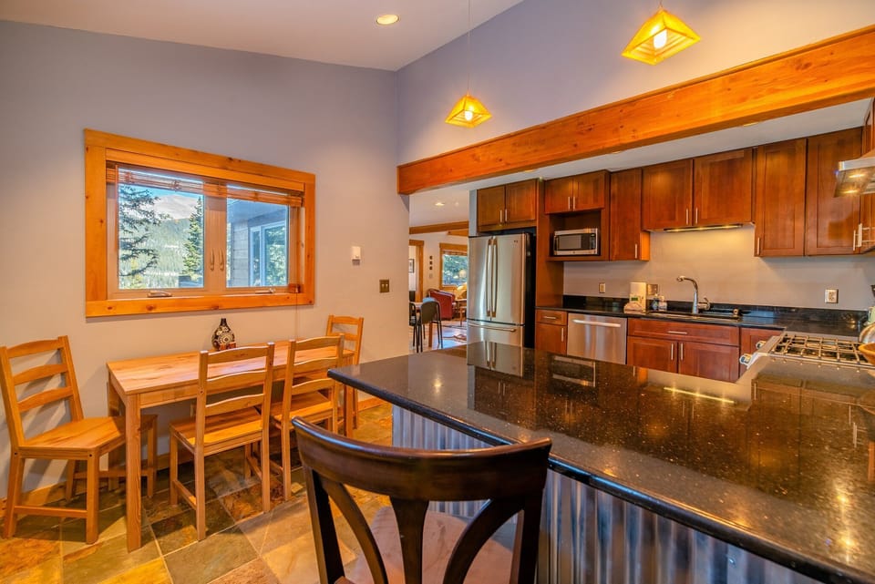 With the in-kitchen breakfast nook and bar seating, everyone in your party will have plenty of space for meal time or game time alike.