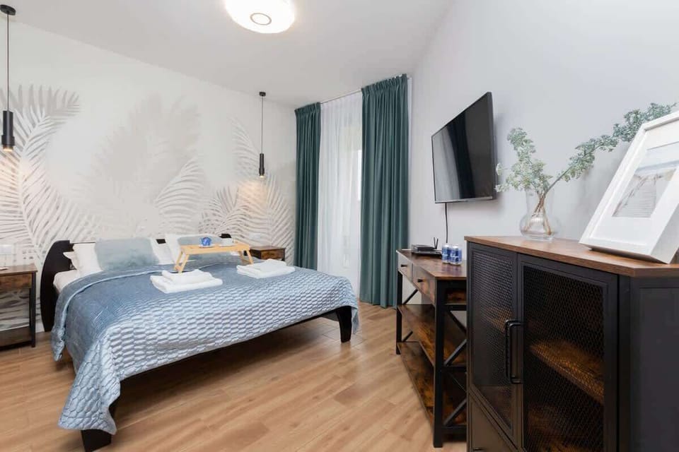 Comfortable double bed in the bedroom. 