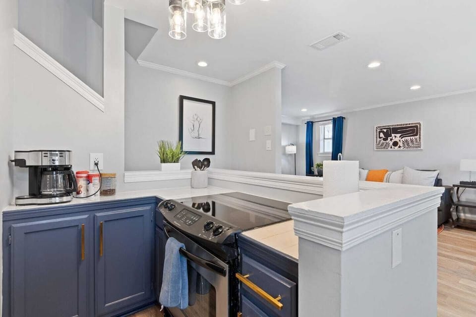 Kitchen opening up to the living room — great flow for entertaining.
