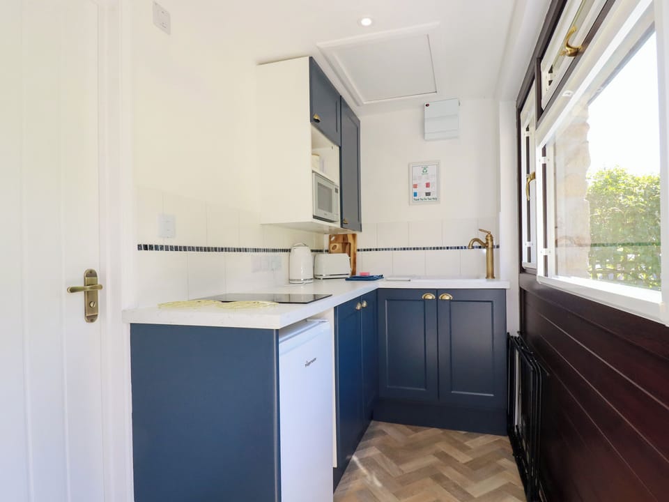Fridge, microwave, electric kettle, toaster
