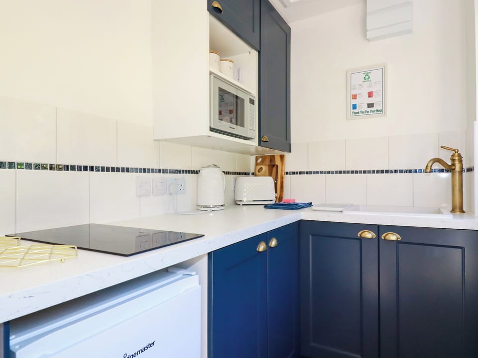 Fridge, microwave, electric kettle, toaster