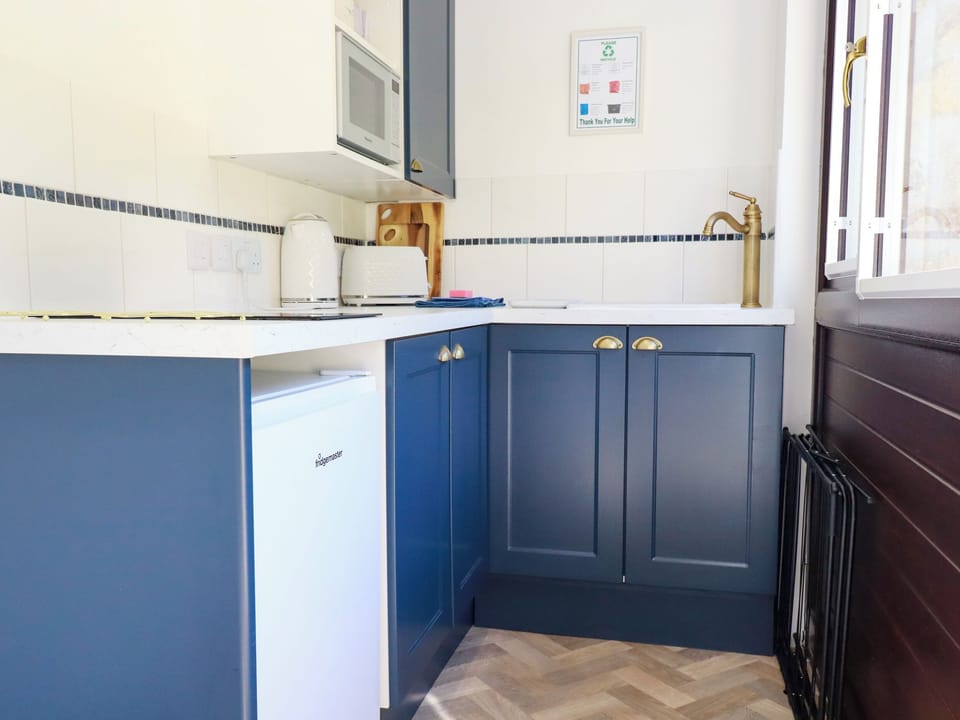 Fridge, microwave, electric kettle, toaster