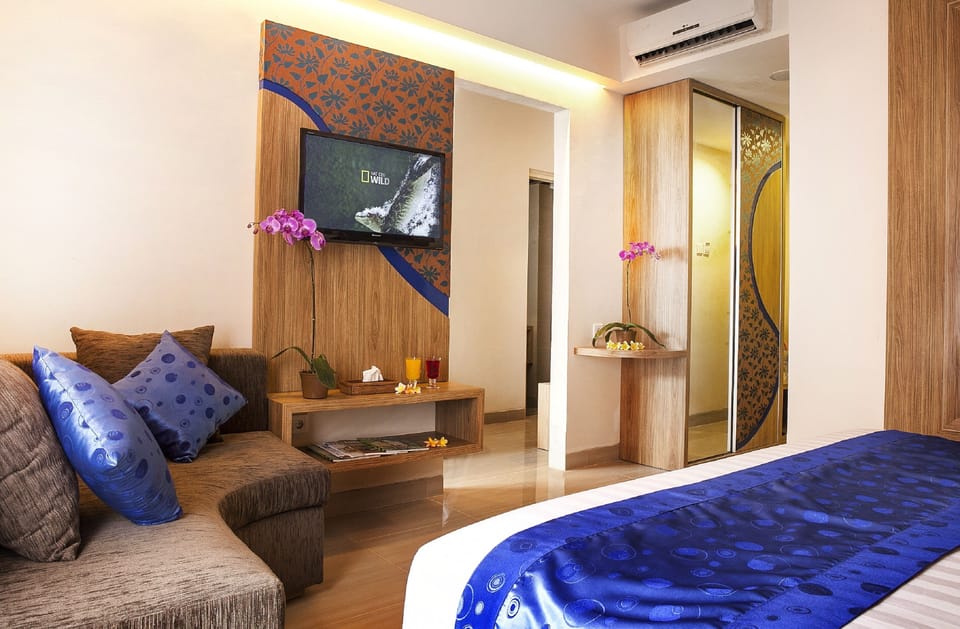 Deluxe Room | Premium bedding, in-room safe, desk, blackout drapes