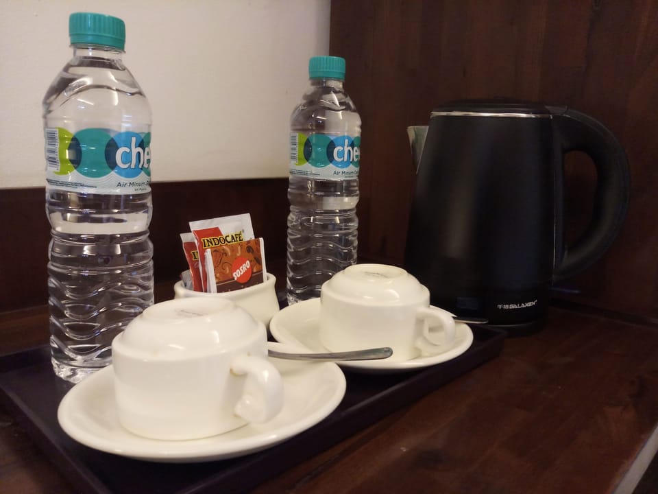 Deluxe Room | Coffee and/or coffee maker