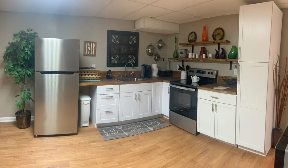 Full kitchen:  dishes, pots/pans, silverware, glasses, Keurig/k-cups.
