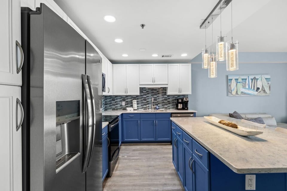 Fully Stocked Kitchen with Ocean Views, Stainless Steel Appliances, Dual Coffee Maker and Island Bar Seating
