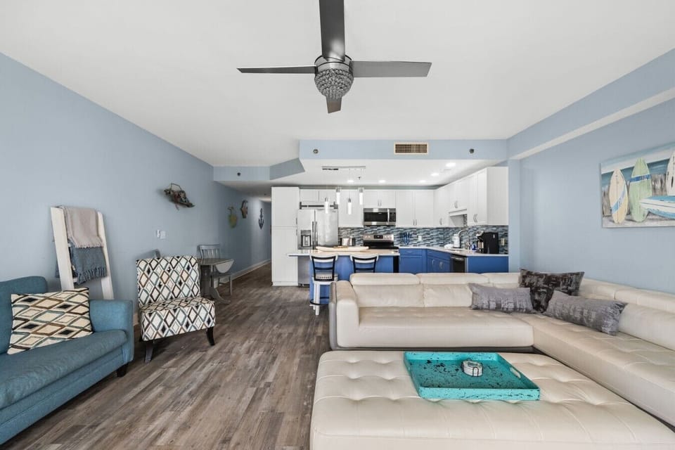 Open Concept Living Room with Ocean Views, Balcony Access, Flat Screen TV and Sleeper Sofa