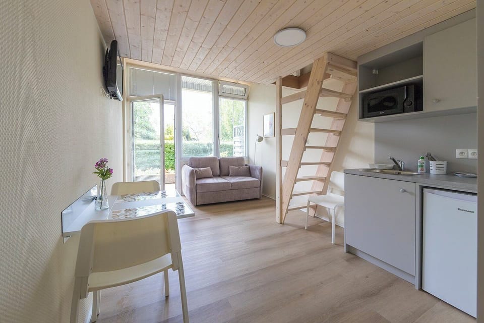 Family Quadruple Room | In-room safe, desk, iron/ironing board