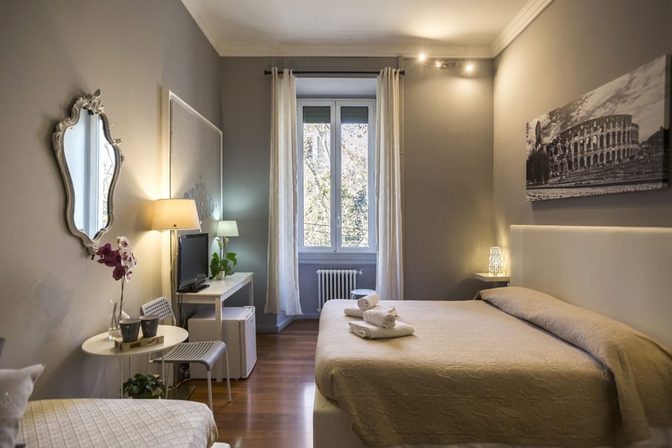 Double Room (External Private Bathroom) | Minibar, in-room safe, desk, cribs/infant beds