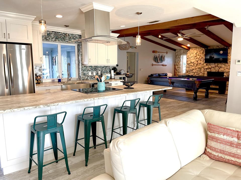Hang out in the kitchen at the kitchen bar