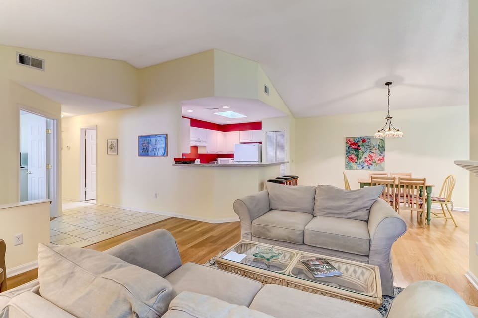 Living room with views to kitchen & dining space