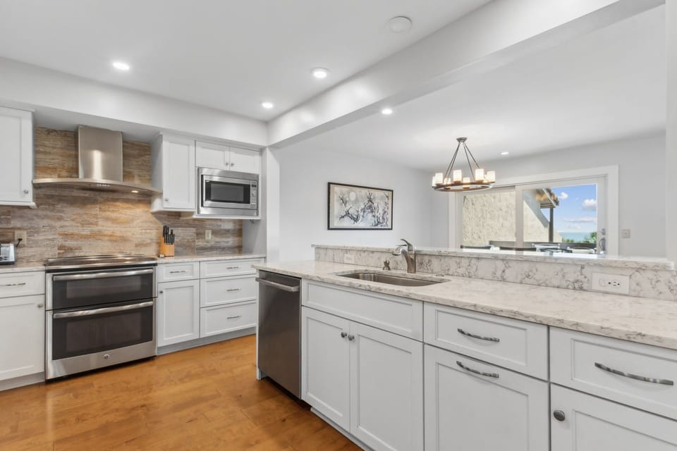 Main level Kitchen as you come up stairwell