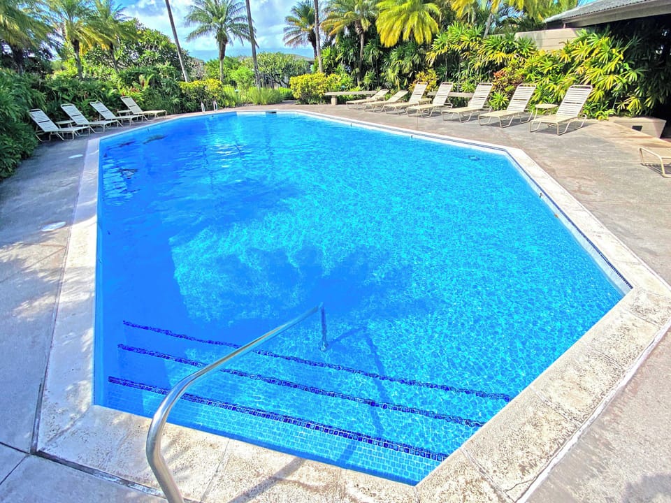 Relax in the sparkling pool surrounded by tropical gardens at this luxury West Maui Kapalua vacation rental. Perfect for unwinding after a day of adventure on this ultimate island retreat experience!