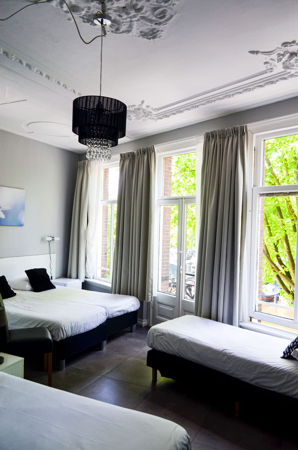 Family Room, Canal View (private shower and shared toilet) | Individually decorated, free WiFi, bed sheets
